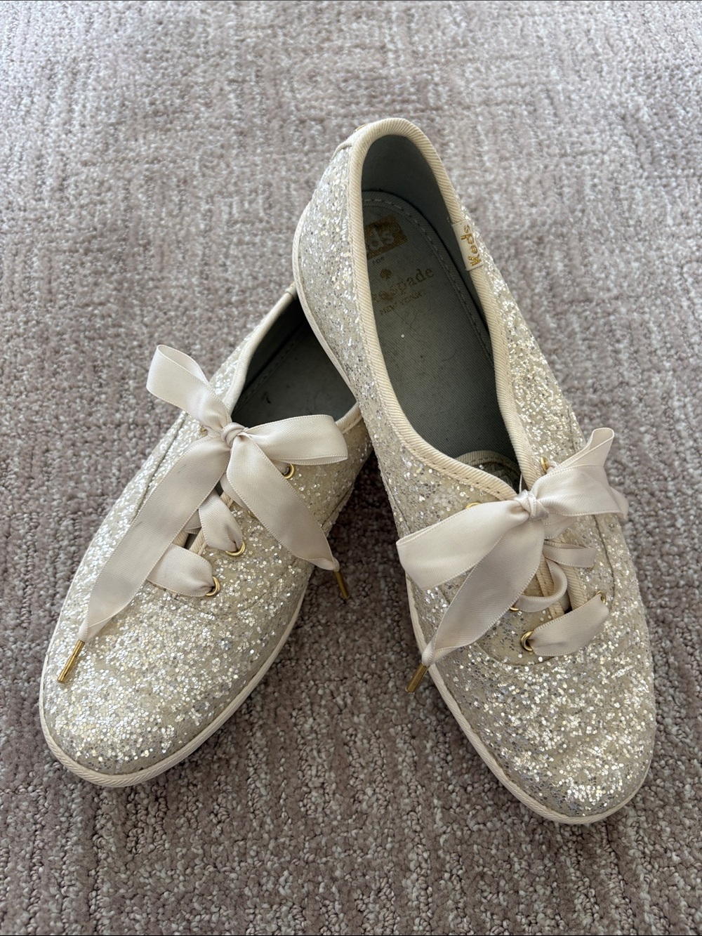 kate spade champagne glitter ribbon‑lace sneakers